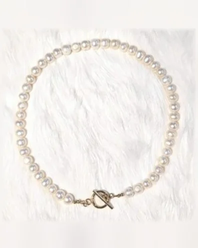 Another view of the Classic Pearl & Gold Toggle Collar Necklace