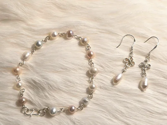 Purple and white freshwater pearl bracelet with matching earrings