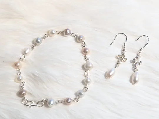 Another view of the Earrings & Bracelet Set in Purples