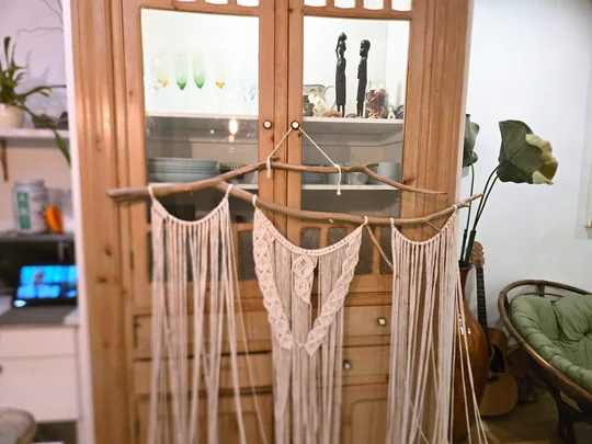 Another view of the Three-Panel Macramé Wall Hanging on Driftwood