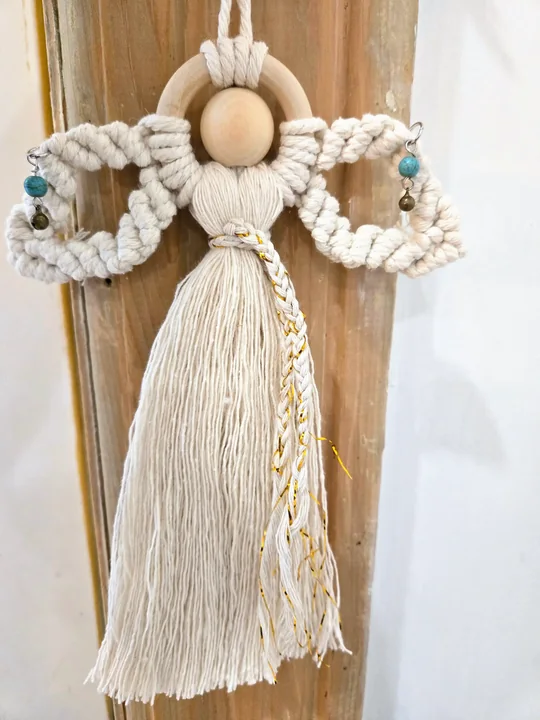 Cream macramé angel with open wings, turquoise beads and a gold braid