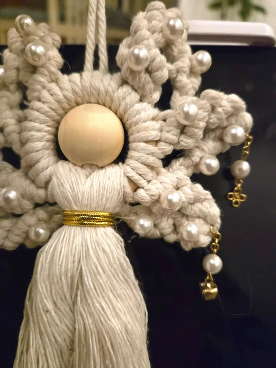 Another view of the Pearl Angel with Gold Bells