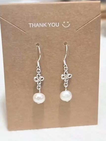 Another view of the Large Classic Pearl Earrings