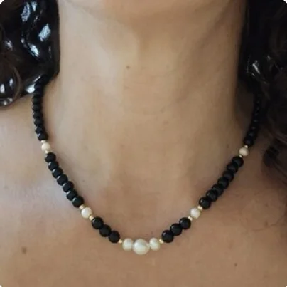 Another view of the Black Onyx, Pearl & 14k Gold-Filled Collar Necklace