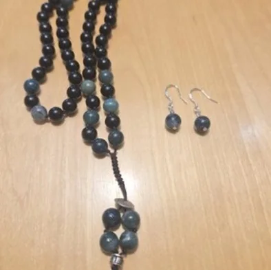 Another view of the Onyx & Moss Agate Mala Necklace
