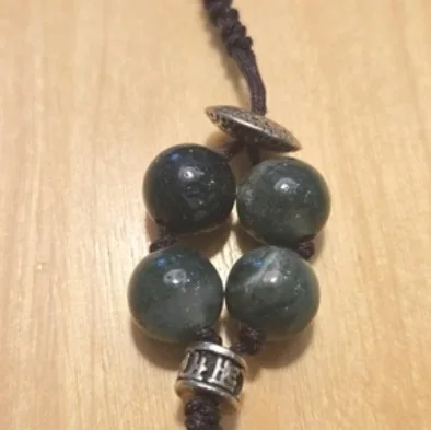 Another view of the Onyx & Moss Agate Mala Necklace