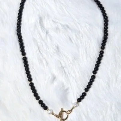 Another view of the Black Onyx, Pearl & 14k Gold-Filled Toggle Necklace