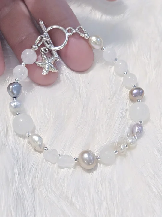 Another view of the Danburite, Moonstone & Pearl Bracelet with Starfish