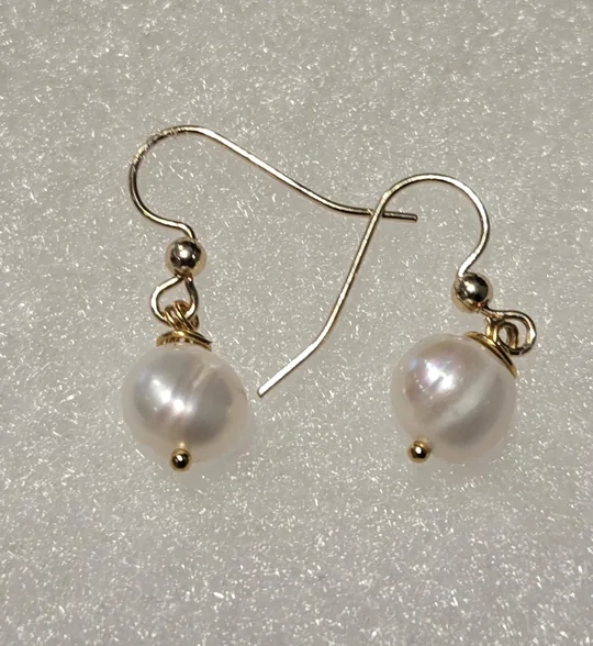 Large white freshwater pearls wire-wrapped in 14k gold-filled wire on gold ear hooks