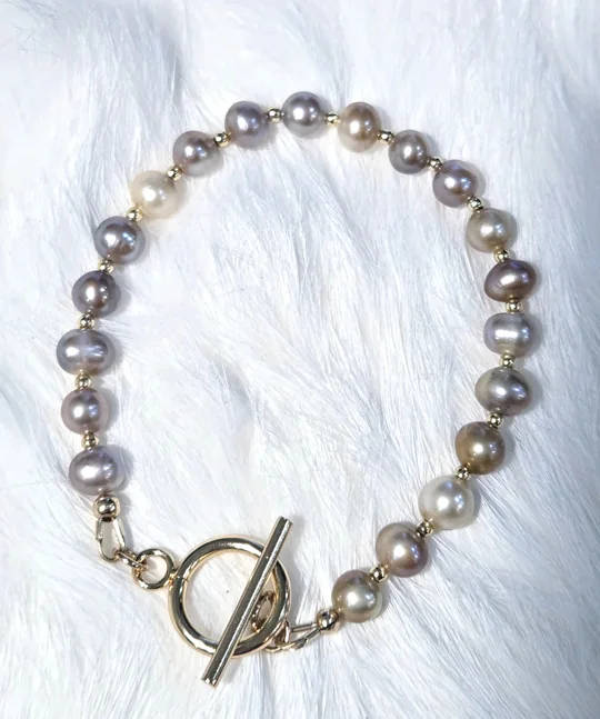 Another view of the Natural Peach Freshwater Pearl & Gold-Filled Toggle Bracelet