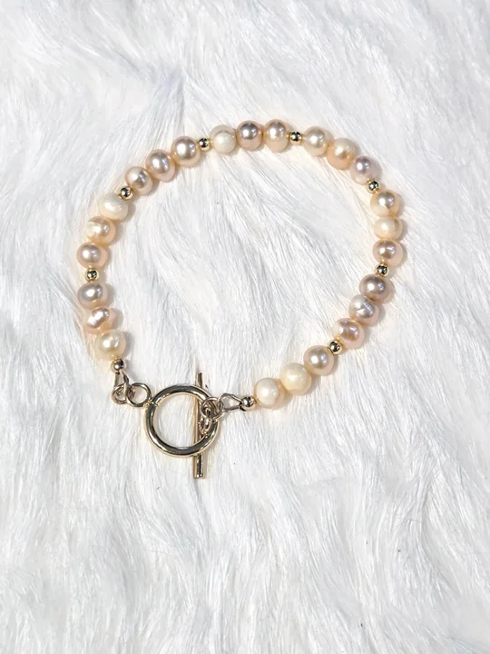 Soft peach freshwater pearl bracelet with 14k gold-filled beads and a gold OT toggle clasp