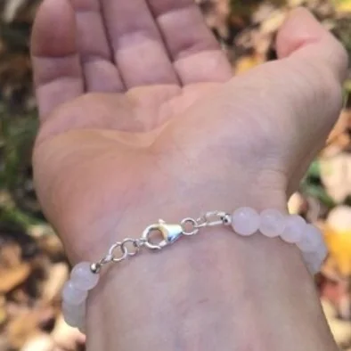 Another view of the Rose Quartz & Danburite Bracelet with Sterling Silver Bead and Clasp