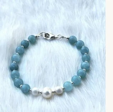 Another view of the Sea Blue Crystal Bracelet with Freshwater Pearls & Sterling Silver Beads and Clasp