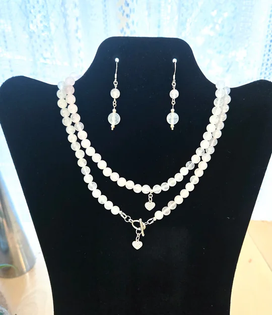 Layered White Pearl Necklaces and Earrings