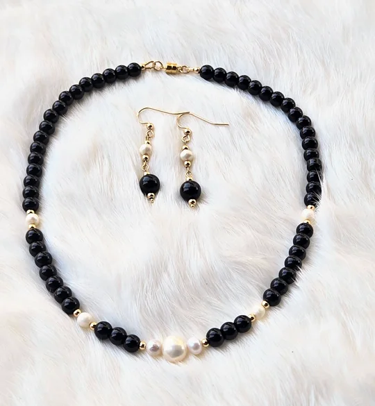 Another view of the Onyx & Pearl Collar Set: Necklace, Bracelet and Earrings