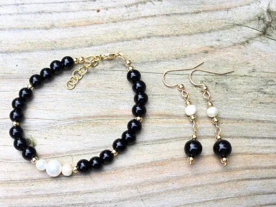 Another view of the Onyx & Pearl Collar Set: Necklace, Bracelet and Earrings