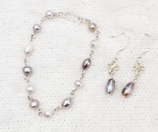 Another view of the Earrings & Bracelet Set in Purples