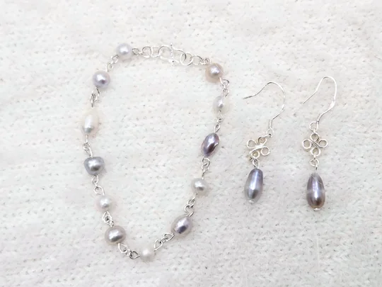 Another view of the Earrings & Bracelet Set in Purples